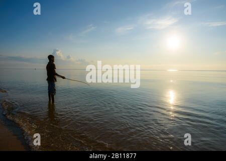 Boy fishing on Lake Malawi, Malawi, Africa Stock Photo