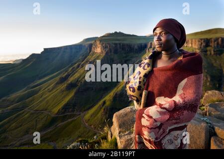 Basotho shepherd with view of Sani Pass, Drakensberg Mountains, mountain range, Lesotho, Africa Stock Photo