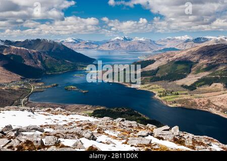 The view westwards from the top of the Pap of Glencoe, looking out over Glencoe village and Invercoe campsite, past Ballachulish. Stock Photo