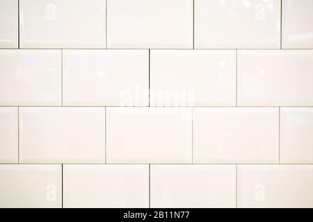 white ceramic rectangular tiles in rectangle form with black filling Stock Photo