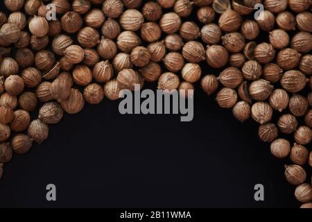 Close-up of seeds of plants isolated on black background Stock Photo