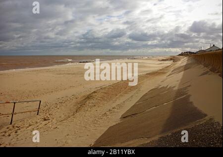 A view along the beach on a breezy day in winter towards Ostend at Walcott, Norfolk, England, United Kingdom, Europe. Stock Photo