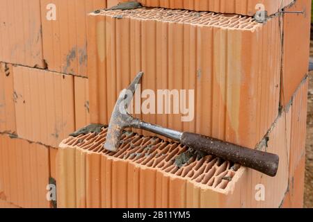 New construction of a house with bricks Stock Photo
