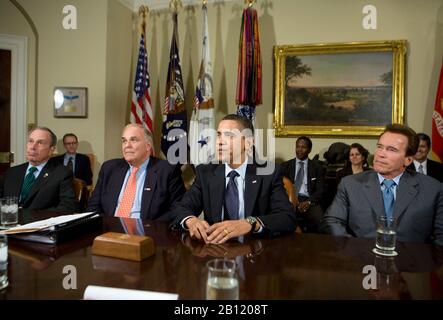 Washington, D.C. - March 20, 2009 -- United States President Barack Obama, right center, meets with California Governor Arnold Schwarzenegger, right, Pennsylvania Governor Ed Rendell, left center, and New York Mayor Michael Bloomberg, left,  in the Roosevelt Room of the White House.   They were meeting to discuss the 'issue of our infrastructure and how we develop the long-term prosperity that's going to be so important for America's success.'.Credit: Kristoffer Tripplaar-Pool via CNP | usage worldwide Stock Photo