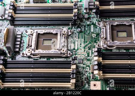 Green computer mainboard with empty cpu socket Stock Photo