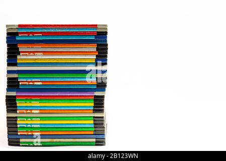 numerous black floppydisks lined up on a white background Stock Photo