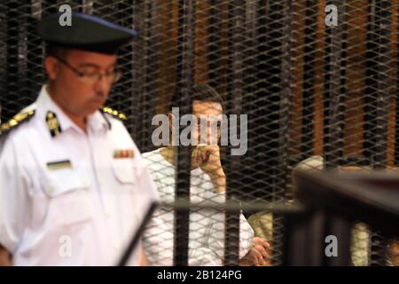 (200222) -- CAIRO, Feb. 22, 2020 (Xinhua) -- File photo taken on July 9, 2012 shows Alaa Mubarak (C), son of ousted Egyptian president Mohamed Hosni Mubarak, in a court in Cairo, Egypt. An Egyptian court acquitted on Saturday Alaa and Gamal Mubarak, the sons of ousted Egyptian president Mohamed Hosni Mubarak, in a corruption case, state-run Ahram Online news website reported. (Xinhua/Ahmed Gomaa) Stock Photo