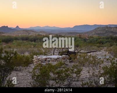 Rusty wagon at sunset in the ghost town of Terlingua, Texas Stock Photo