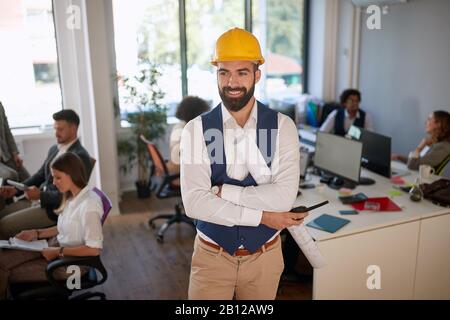 young engineer, architect, designer, in bureau office. business, modern, casual concept Stock Photo
