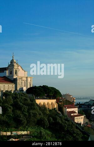 View from Miradouro da Senhora do Monte in Graca to the Convento de Nossa Sehora Church, Alfama and Tejo river Stock Photo