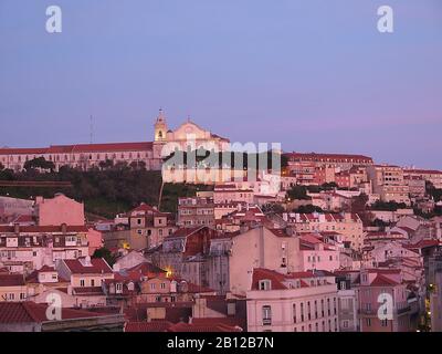 View from Miradouro da Senhora do Monte in Graca to the Convento de Nossa Sehora Church, Alfama and Tejo river Stock Photo