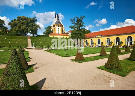Collegiate Church of St. Mary and orangery with cloister garden at the monastery Neuzelle, Brandenburg, Germany Stock Photo