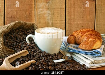 cappuccino, brioches and newspaper with background Stock Photo