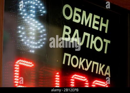 American dollar sign and the Russian inscription 'Currency exchange, purchase' on the board of the exchange office with the rates of convertible currencies in central Moscow, Russia Stock Photo