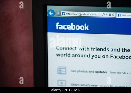 London, United Kingdom - Feb 28, 2014: Facebook social network website address on computer display screen with message connect with your friends - tilt-shift lens used Stock Photo