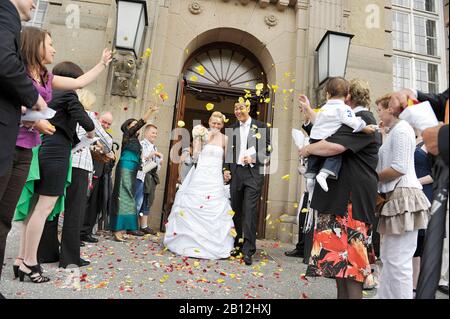 Bride and groom comes from the registry office,bridal couple,wedding,bride,groom,registry office,Rathaus Schöneberg,Berlin,Germany,Europe Stock Photo