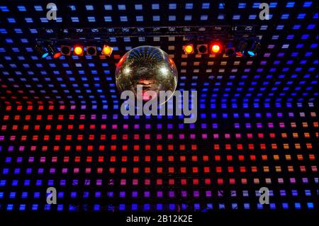Disco ball on the stage of the famous Christmas market Santa Pauli on the Reeperbahn,St. Pauli,Hanseatic city Hamburg,Germany,Europe Stock Photo