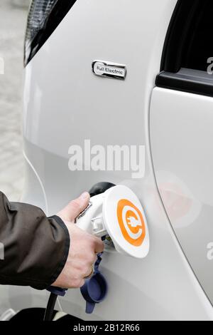 First series-produced,pure electric car in Germany,Citroen C-ZERO AIRDREAM at a charging station,charging,electromobility,electric car,Hamburg,Germany,Europe Stock Photo