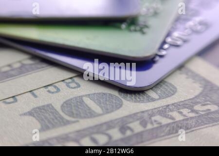 Close up of credit card and cash on table  Stock Photo