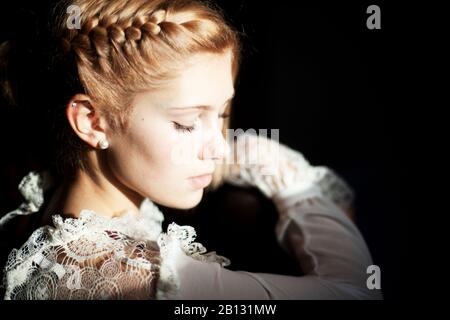 Portrait of a young woman,light and shadow Stock Photo