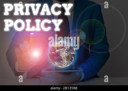 Writing note showing Privacy Policy. Business concept for statement or a legal document that discloses clients data Elements of this image furnished b Stock Photo