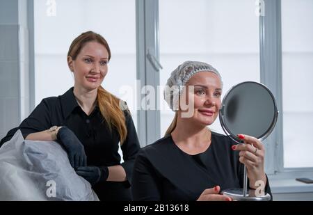 cosmetologist receives the patient in the office Stock Photo