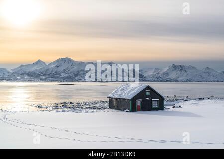 Cottage by the fjord near Holmstad,Vesterålen,Norway Stock Photo