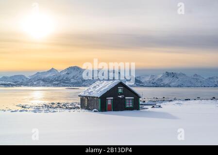 Cottage by the fjord near Holmstad,Vesterålen,Norway Stock Photo