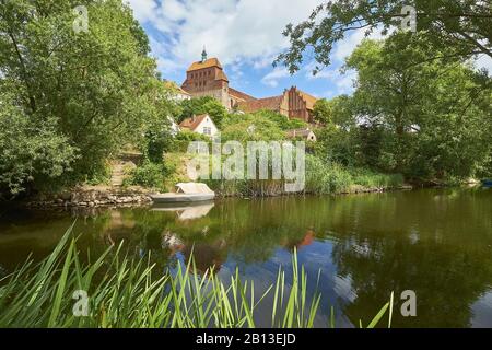 View over Havel side canal to Domberg with cathedral and former Prämonstratenserstift St. Marien,Havelberg,Saxony Anhalt,Germany Premonstratensian monastery St. Marien,Havelberg,Saxony Anhalt,Germany Stock Photo