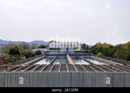 Modern wastewater treatment plant. Tanks for aeration and biological purification of sewage by using active sludge. Stock Photo