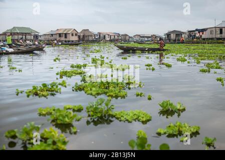 Residents of floating village GanviÈ,Benin,Africa People of the floating village of Ganvi√ ©,Benin,Africa Stock Photo