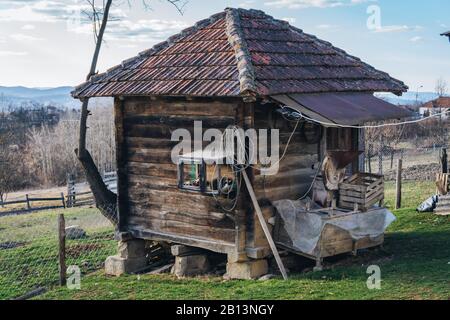 Old hut on a farm in Serbia Stock Photo