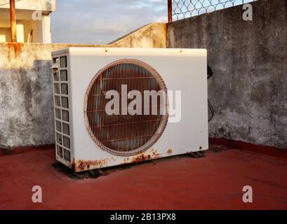 View of a mini split air conditioner condensing unit outdoor on a roof Stock Photo