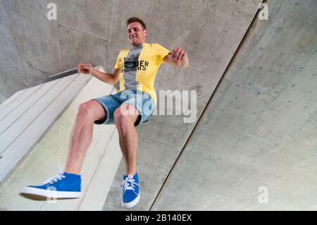 Young man is jumping Stock Photo