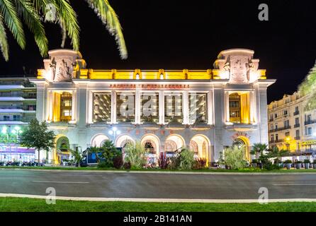 The Casino Mediterranean or Casino Du Palais De La Méditerranée, along the street and promenade of the French Riviera city of Nice, France at night. Stock Photo