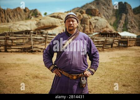 Nomad in traditional clothing, Mongolian Switzerland, Gobi Desert, Mongolia Stock Photo