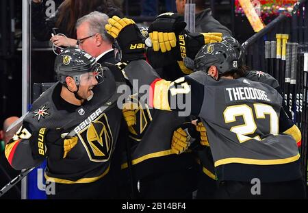 Las Vegas, USA. 22nd Feb, 2020. Feb 22, 2020; Las Vegas, Nevada, USA; Vegas Golden Knights defenseman Alec Martinez (23) celebrates with defenseman Shea Theodore (27) on the bench after an empty net goal by Vegas right wing Reilly Smith (19) against the Florida Panthers during the third period at T-Mobile Arena. Mandatory Credit: Stephen R. Credit: Sipa USA/Alamy Live News Stock Photo