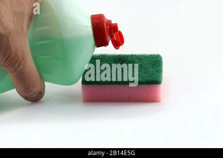 Yellow foam rubber sponge for dishwashing on white background. House  cleaning tool. Simple everyday cleaning sponge studio photo. Everyday  routine dom Stock Photo - Alamy