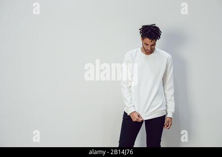 African american man wearing white blank sweatshirt. Mock-up. Stock Photo