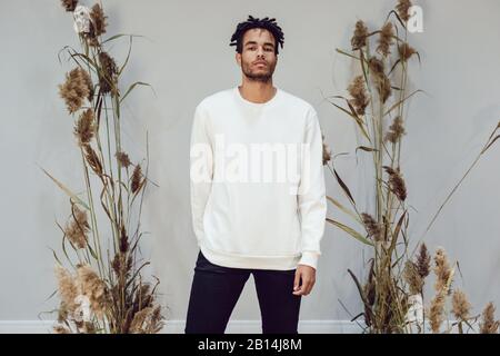 African american man wearing white blank sweatshirt. Mock-up. Stock Photo