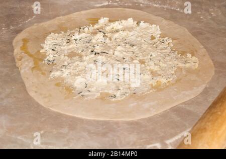 Pies in the cooking process, cheese pies Stock Photo