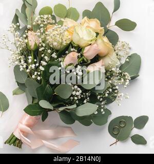 Wedding bride bouquet of cream colored roses Stock Photo