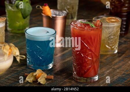 Many different multi-colored cocktails with different colors Stock Photo