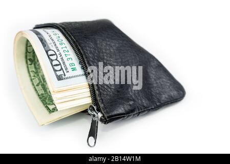 Wallet full of dollars in a roll on a white Stock Photo