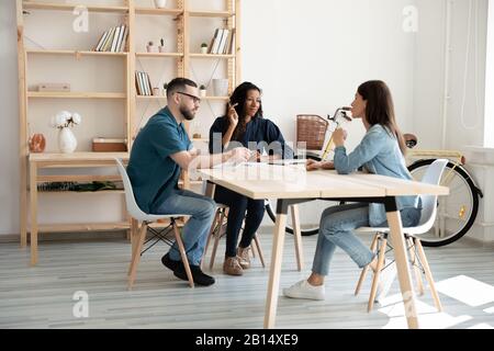 Interested mixed race female male hr managers listening to applicant. Stock Photo