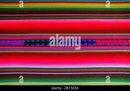 Detail of a bright traditional Mayan Guatemalan woven colorful striped fabric Stock Photo