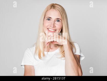 Close up portrait of laughing mature woman Stock Photo