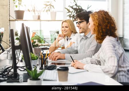 Team of business analysts working on new project Stock Photo