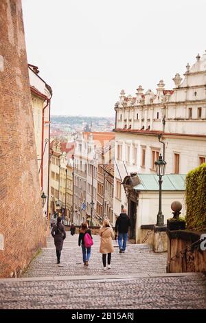 People walking down Castle Steps, Zámecké schody a steep path since 1278 and was in the Middle Ages known as a steep path Praha-Malá Strana, Czechia Stock Photo