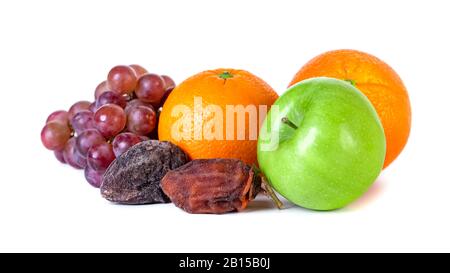 Apple, orange, grape and dry persimmon isolated on white background Stock Photo